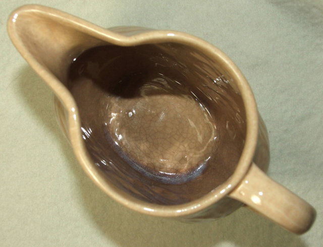 Old Brush McCoy Flower Embossed Tan Pitcher