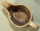 Old Brush McCoy Flower Embossed Tan Pitcher