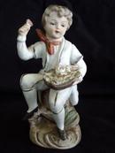 Norleans Japan Bisque Boy with Flowers