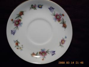 Two Sango China Saucers