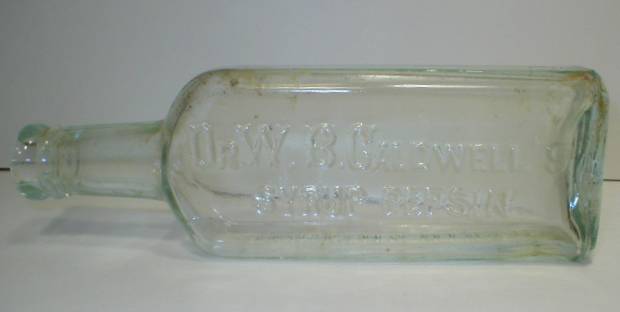 Very Light Blue Dr. W. B. Caldwell's Syrup Pepsin Bottle