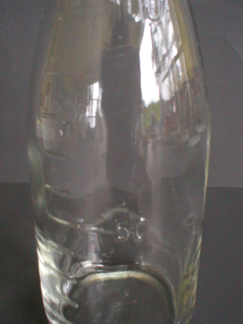 Interresting Little Glass Measuring Bottle
