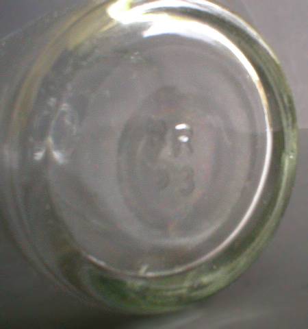 Interresting Little Glass Measuring Bottle