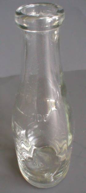 Interresting Little Glass Measuring Bottle