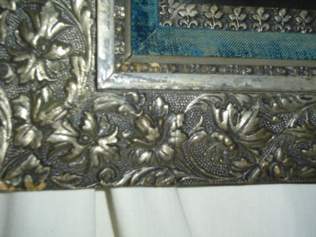 Hammered Metal floral frame mirror