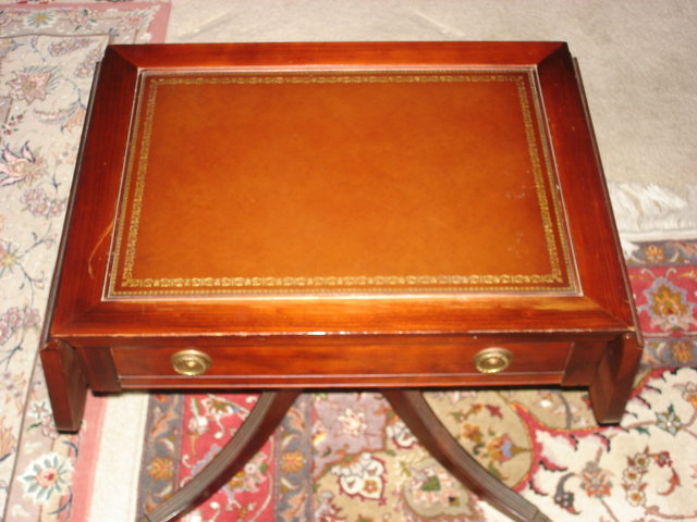 Drop leaf silver storage table