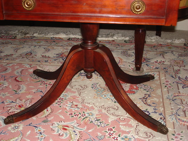 Drop leaf silver storage table