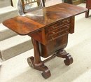 American Empire drop-leaf flame mahogany sewing table