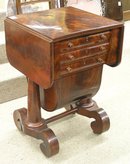 American Empire drop-leaf flame mahogany sewing table