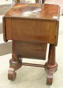 American Empire drop-leaf flame mahogany sewing table