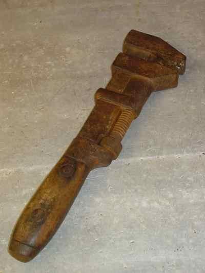 Vintage Stronghold P. S. & W Company Iron & Wooden Wrench