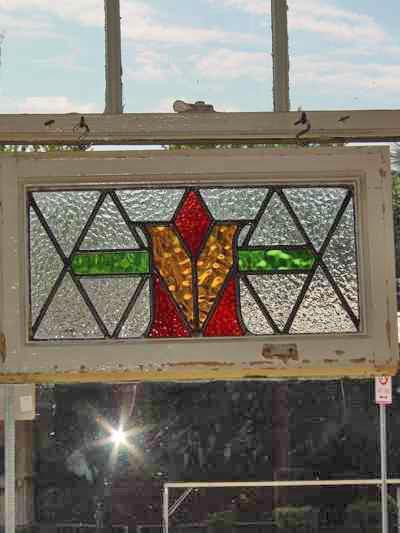 Stylized Red Bud in Amber Vase Antique Stained Glass