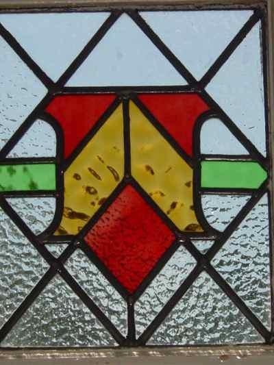 Stylized Red Bud in Amber Vase Antique Stained Glass