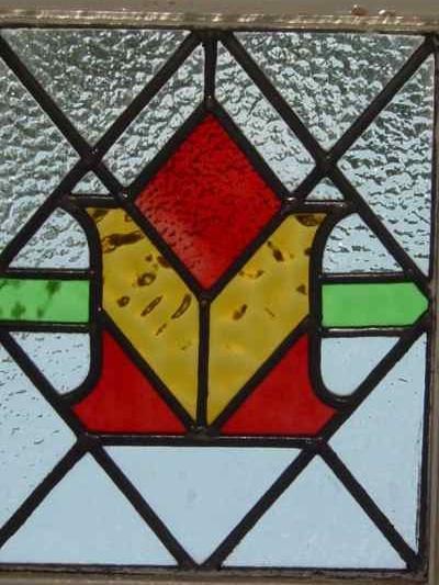 Stylized Red Bud in Amber Vase Antique Stained Glass