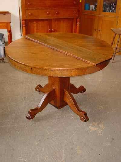 Antique Solid Oak Pedestal Table with Leaf