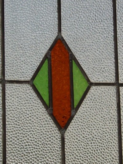 Green and Dark Orange Diamond Antique Stained Glass Window