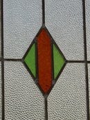 Green and Dark Orange Diamond Antique Stained Glass Window