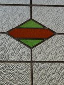 Green and Dark Orange Diamond Antique Stained Glass Window