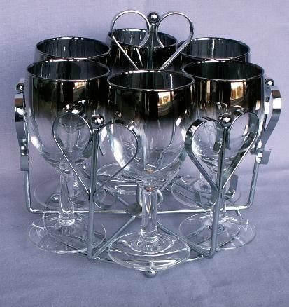 Six Stemmed Wine Glasses in Chromed Carrier