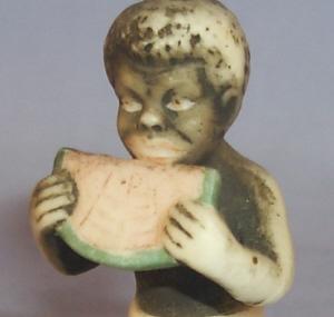 Black Boy Eating Watermelon Sitting On Alligator Porcelain Figurine - Ethnographic