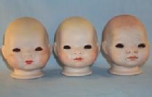 Three Grace S. Putnam Bisque Porcelain Baby Doll Heads