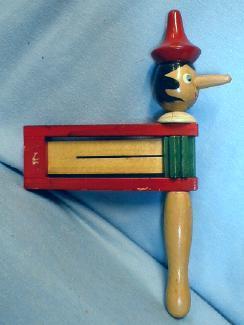 unique Old Pinocchio Noise Maker - Vintage Wooden Toy