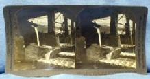 Photograph Steel Mill LADLE POURING of MOLTEN METAL into PIG IRON MACHINES - PA USA Stereo View - Keystone View Card - vintage paper