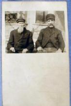 RPPC Real Photo Postcard - Two Unidentified Men Seated - misc paper