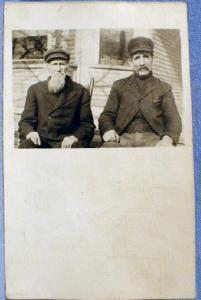 RPPC Real Photo Postcard - Two Unidentified Men Seated - misc paper