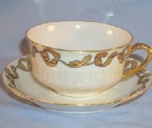 Signed LIMOGES Gold Trimmed Porcelain Cup and Saucer