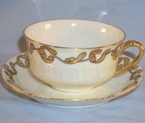 Signed LIMOGES Gold Trimmed Porcelain Cup and Saucer
