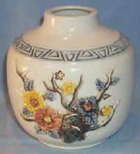 Raised Flower Decorated White Pottery Vase
