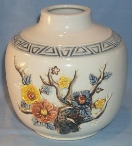 Raised Flower Decorated White Pottery Vase