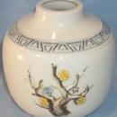 Raised Flower Decorated White Pottery Vase