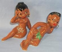 BLACK NATIVE COUPLE ON THE BEACH Porcelain Figurines
