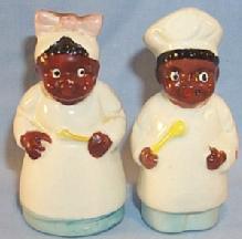 Ethnographic Black Porcelain Chef And Mammy Salt And Pepper Shakers.