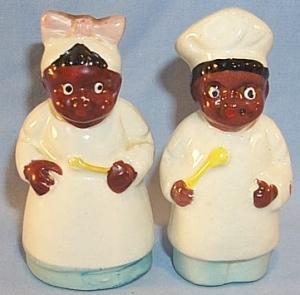 Ethnographic Black Porcelain Chef And Mammy Salt And Pepper Shakers.
