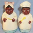 Ethnographic Black Porcelain Chef And Mammy Salt And Pepper Shakers.