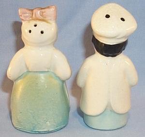 Ethnographic Black Porcelain Chef And Mammy Salt And Pepper Shakers.