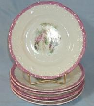 Six Small Unmarked Decorated Porcelain Plates