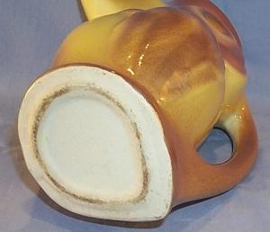 Unusual Brown/Yellow Bird Pottery Pitcher