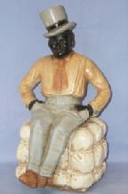 Ceramic BLACK MAN IN TOP HAT SITTING ON COTTON BALE Figurine - Ethnographic