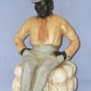 Ceramic BLACK MAN IN TOP HAT SITTING ON COTTON BALE Figurine - Ethnographic