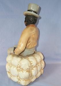 Ceramic BLACK MAN IN TOP HAT SITTING ON COTTON BALE Figurine - Ethnographic