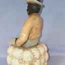 Ceramic BLACK MAN IN TOP HAT SITTING ON COTTON BALE Figurine - Ethnographic