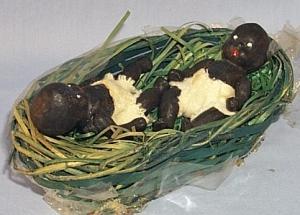 Ethnographic Two Bisque Black Babies in a Green Weaved Basket - Dolls