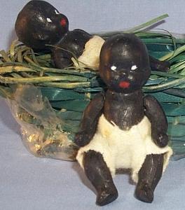 Ethnographic Two Bisque Black Babies in a Green Weaved Basket - Dolls
