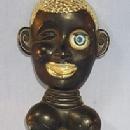 Ethnographic Black Worman's Head with Winking Eye Bottle Opener - Metalware