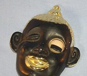 Ethnographic Black Worman's Head with Winking Eye Bottle Opener - Metalware