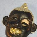 Ethnographic Black Worman's Head with Winking Eye Bottle Opener - Metalware